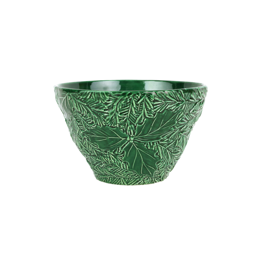 Green ceramic bowl with holly leaf pattern on a white background