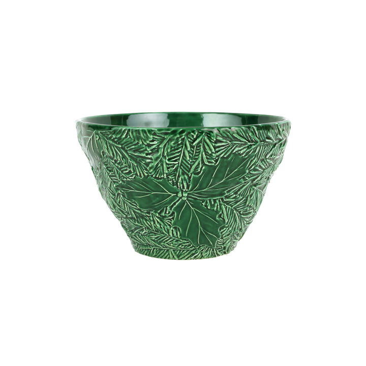 Green ceramic bowl with holly leaf pattern on a white background