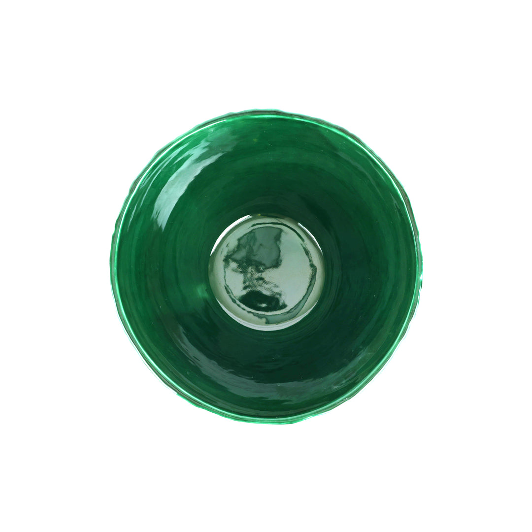 Green ceramic bowl on a white background