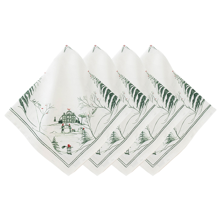 Set of four napkins with winter scene design on a white background
