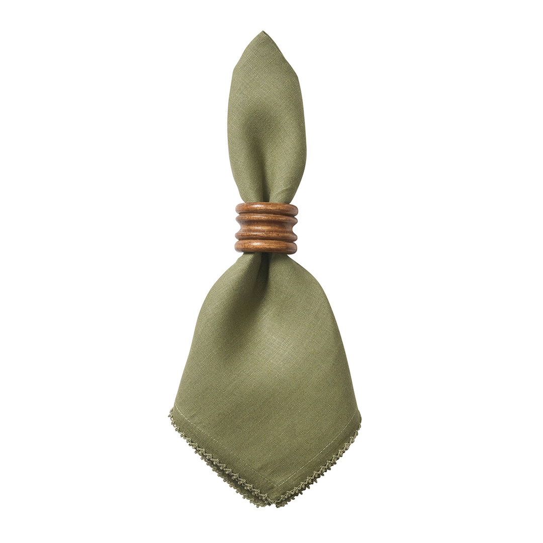 Green napkin with a wooden ring