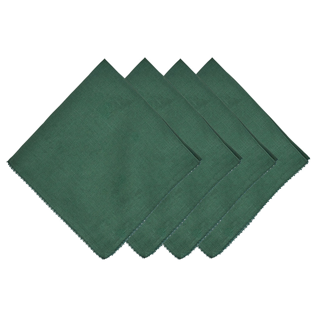 Four green napkins arranged in a diamond pattern