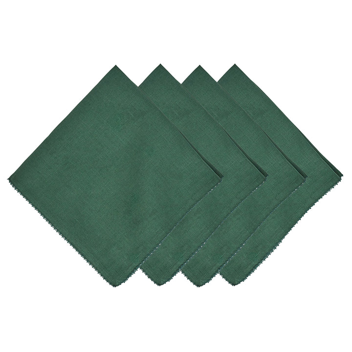 Four green napkins arranged in a diamond pattern