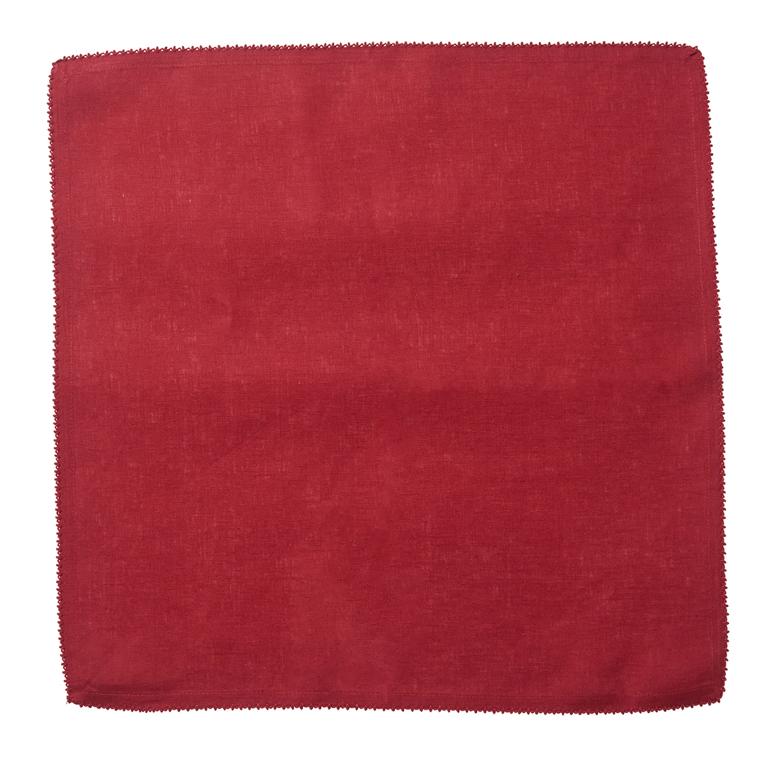 Red napkin with an embroidered edge 