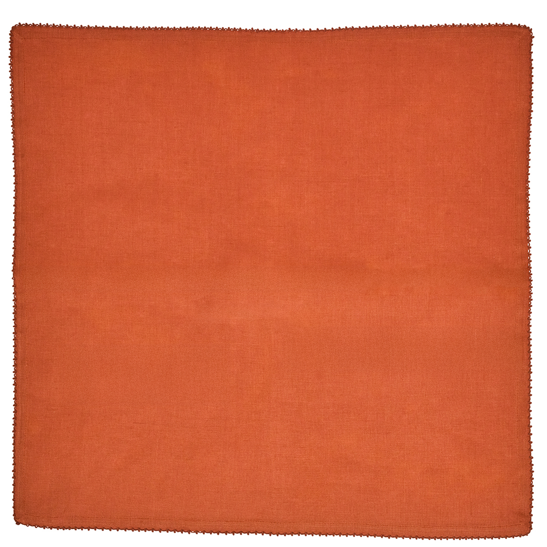 Square orange napkin with an embroidered edge