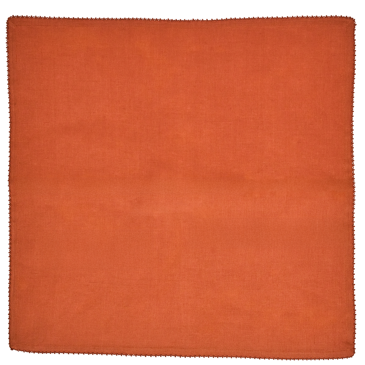 Square orange napkin with an embroidered edge