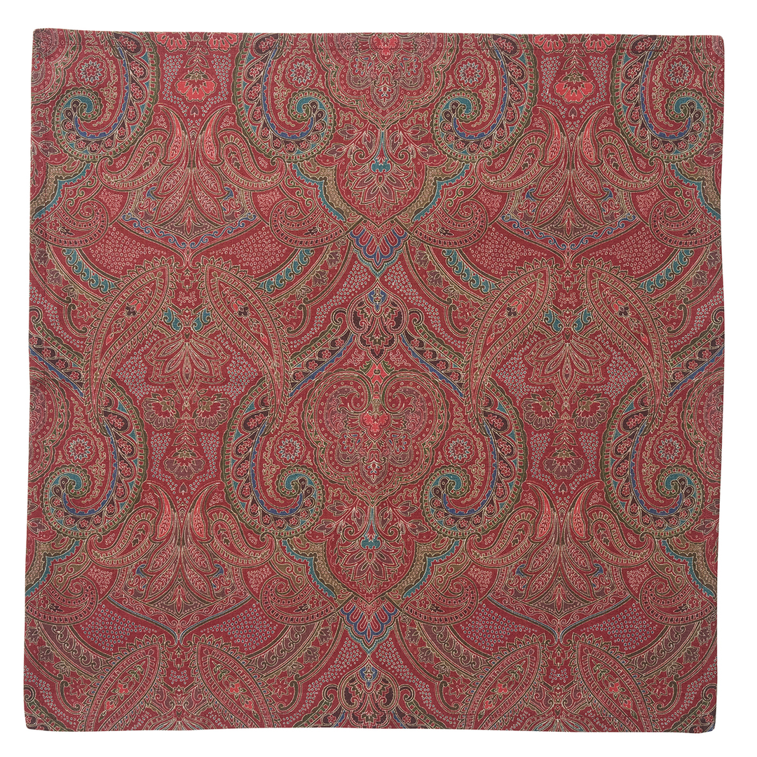 Red paisley patterned fabric
