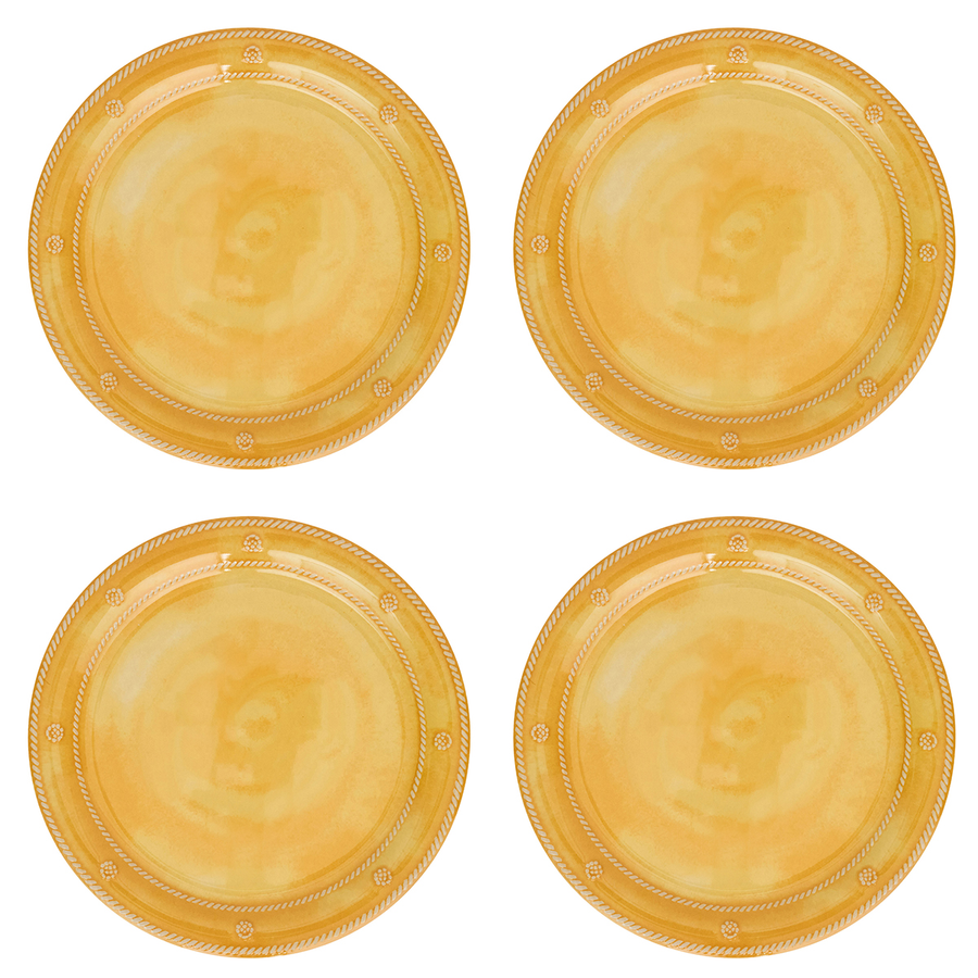 Four round gold plastic plates arranged in a 2x2 grid