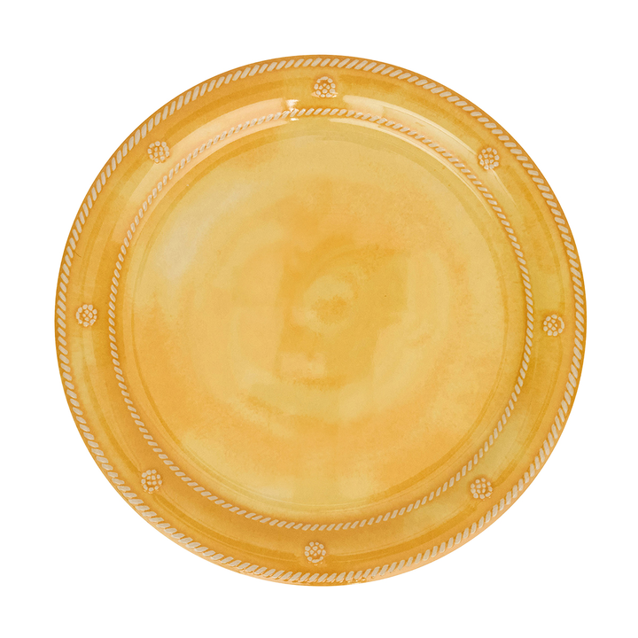 Yellow ceramic plate with decorative edge