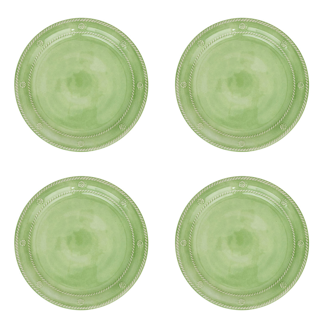 Four light green round plates 