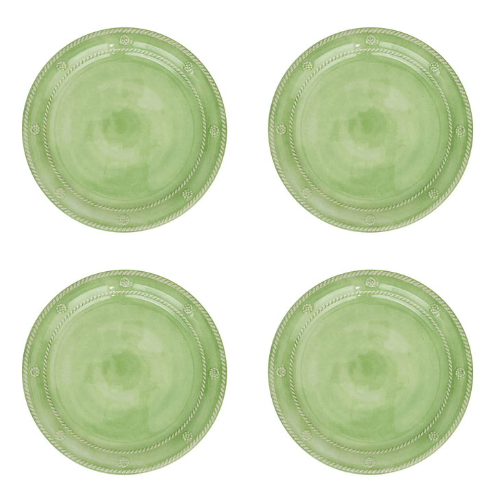 Four light green round plates 