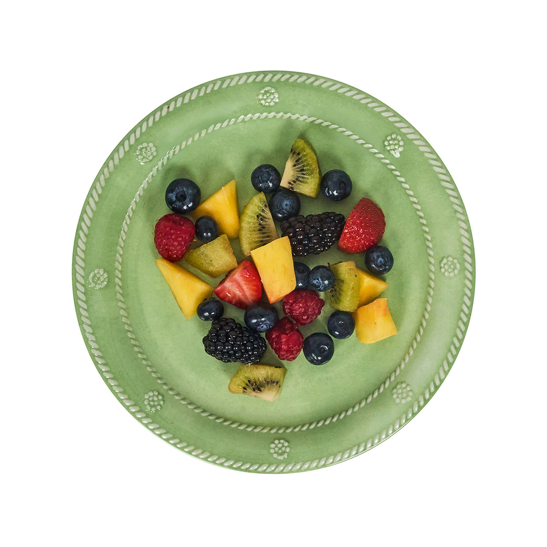 Green plate with assorted fruit 