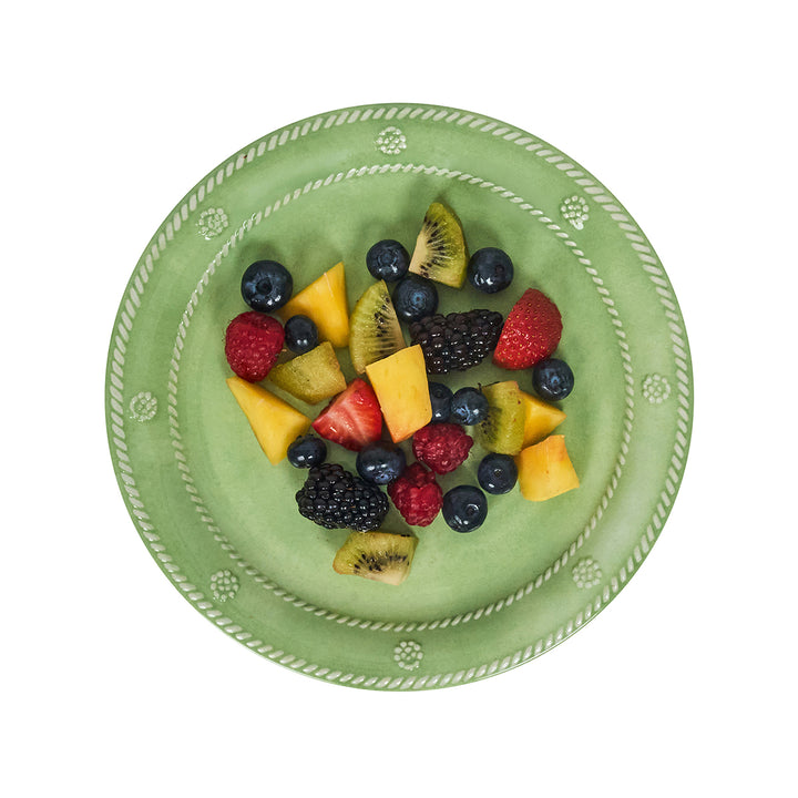 Green plate with assorted fruit 