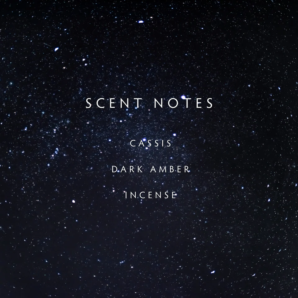 Text 'SCENT NOTES CASSIS DARK AMBER INCENSE' on a starry night sky background