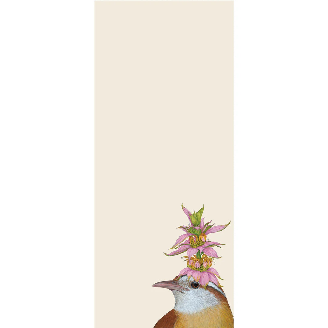 jotter note with an illustration of a bird with a pink flower on its head 