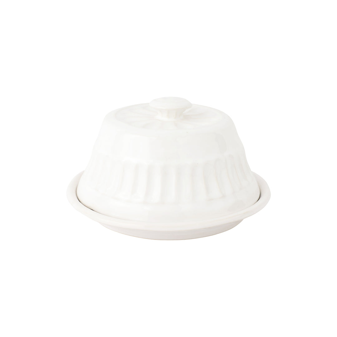 A white ceramic container with a domed top