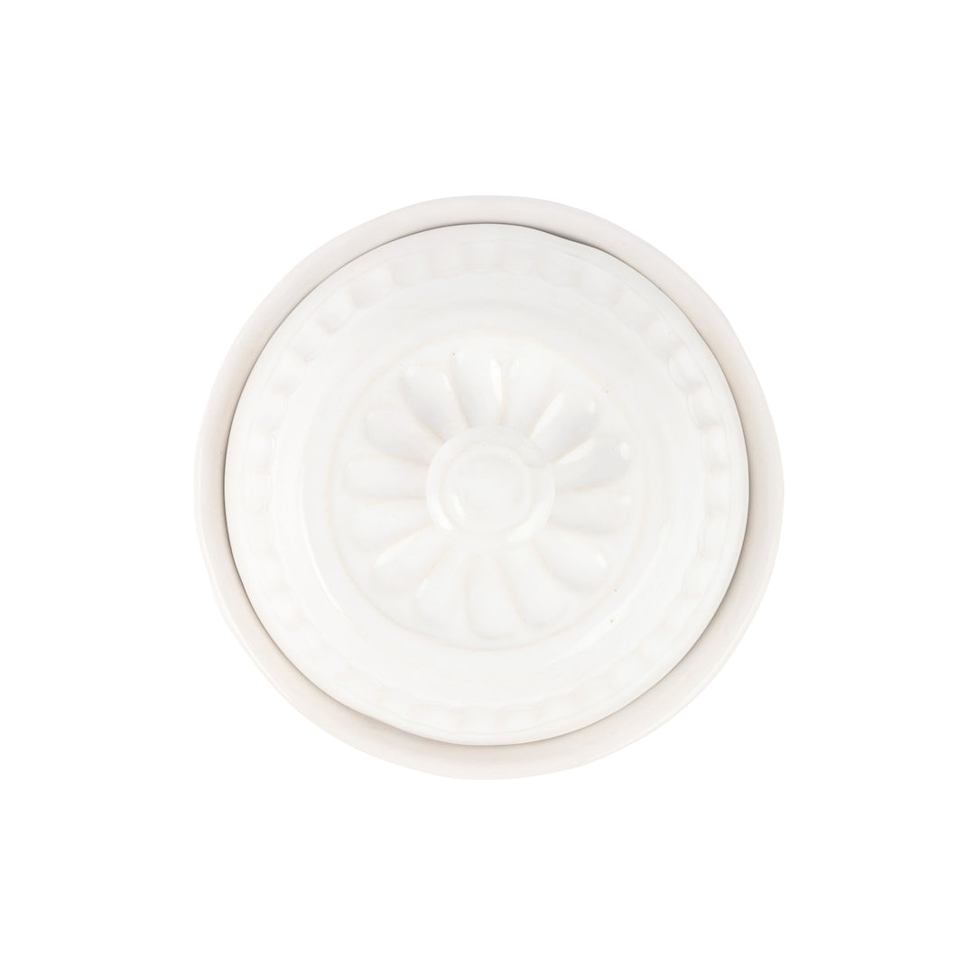The top of a ceramic domed container 