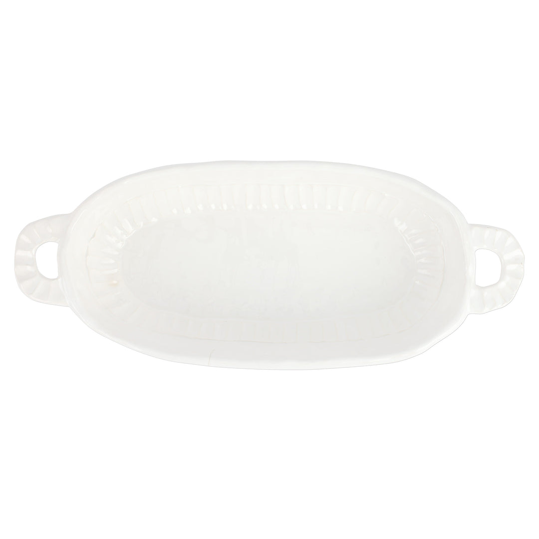 White ceramic baking dish with handles on a white background