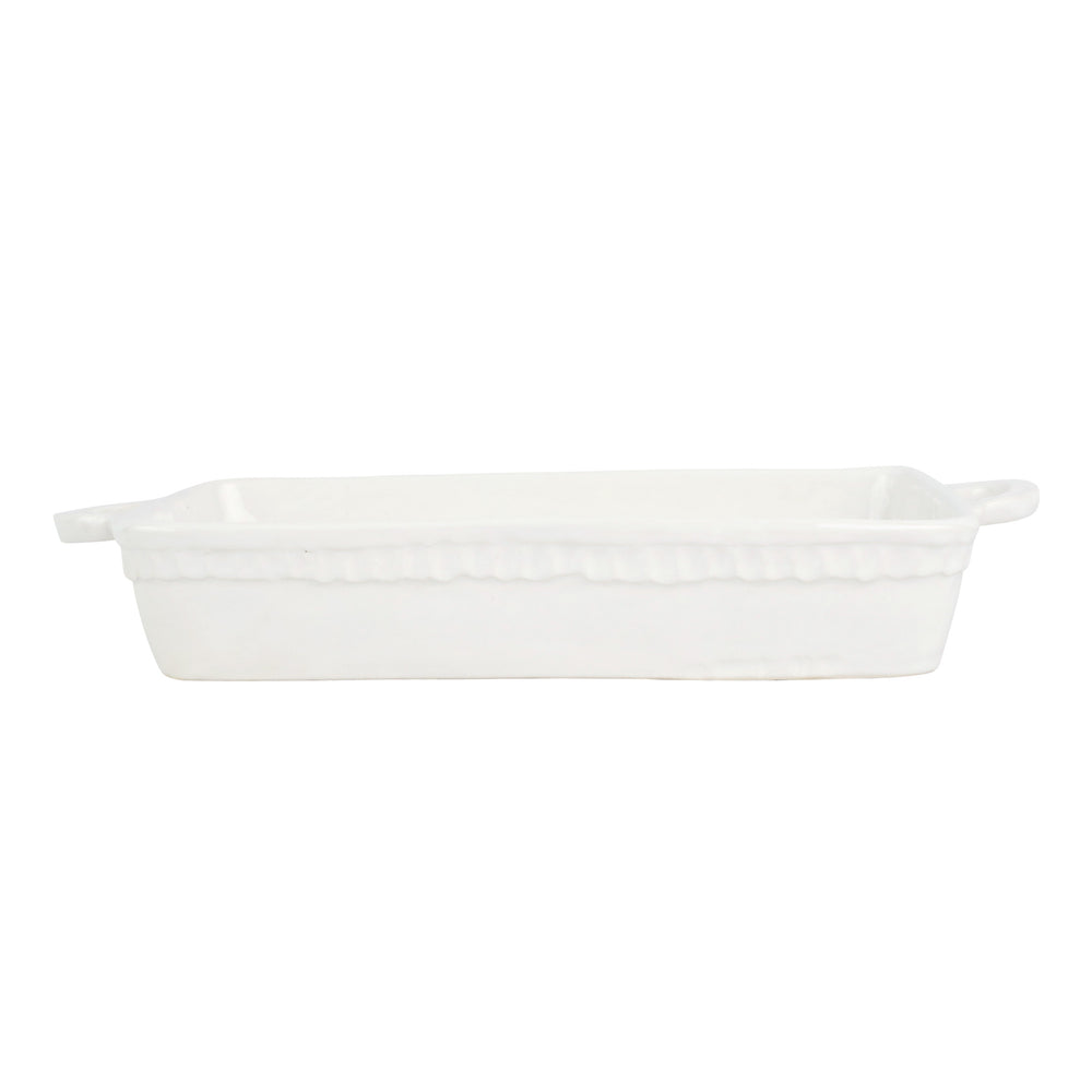 A white ceramic baking dish with handles