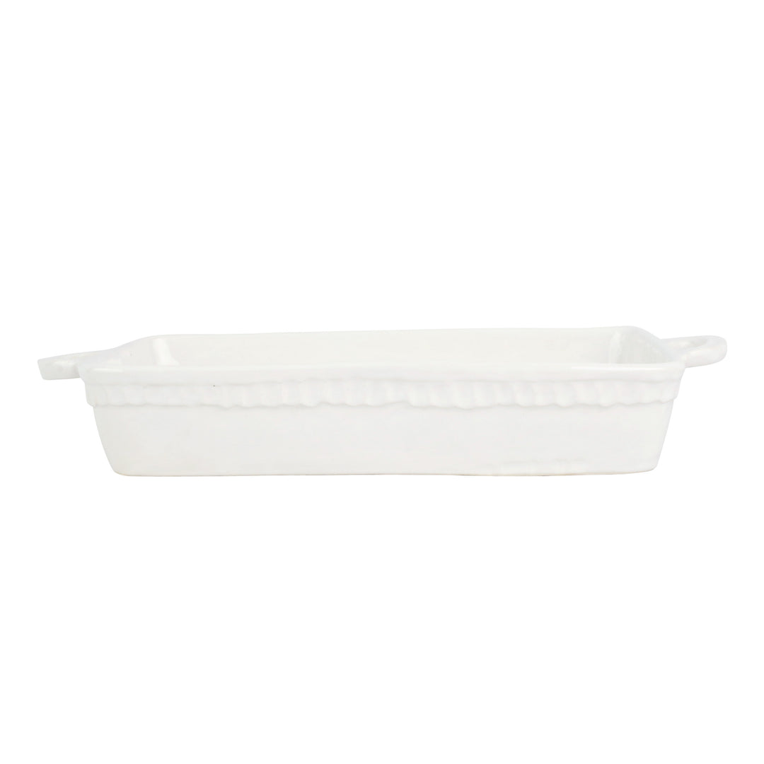 A white ceramic baking dish with handles