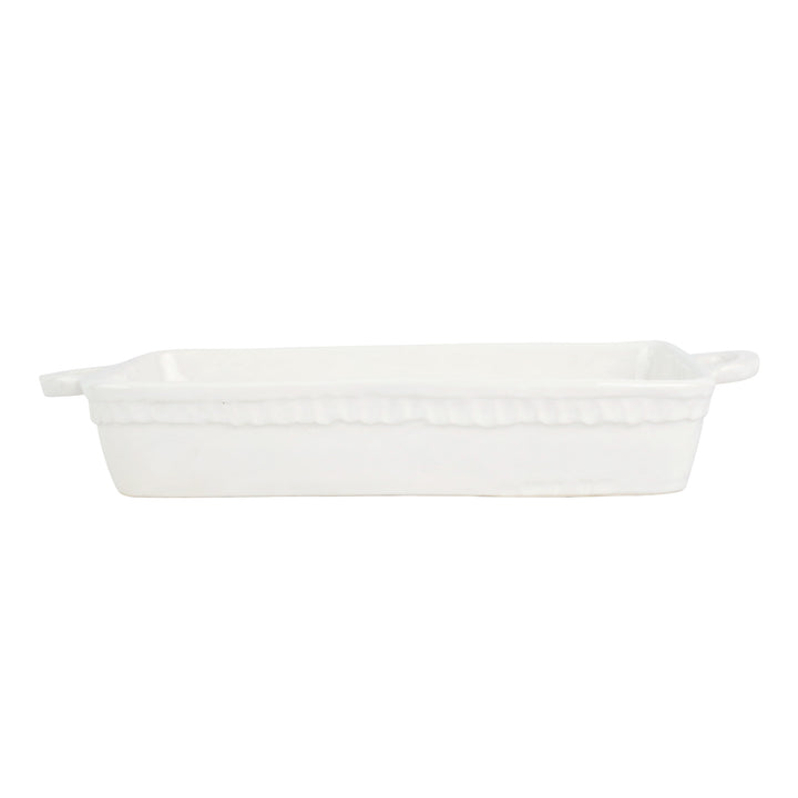 A white ceramic baking dish with handles