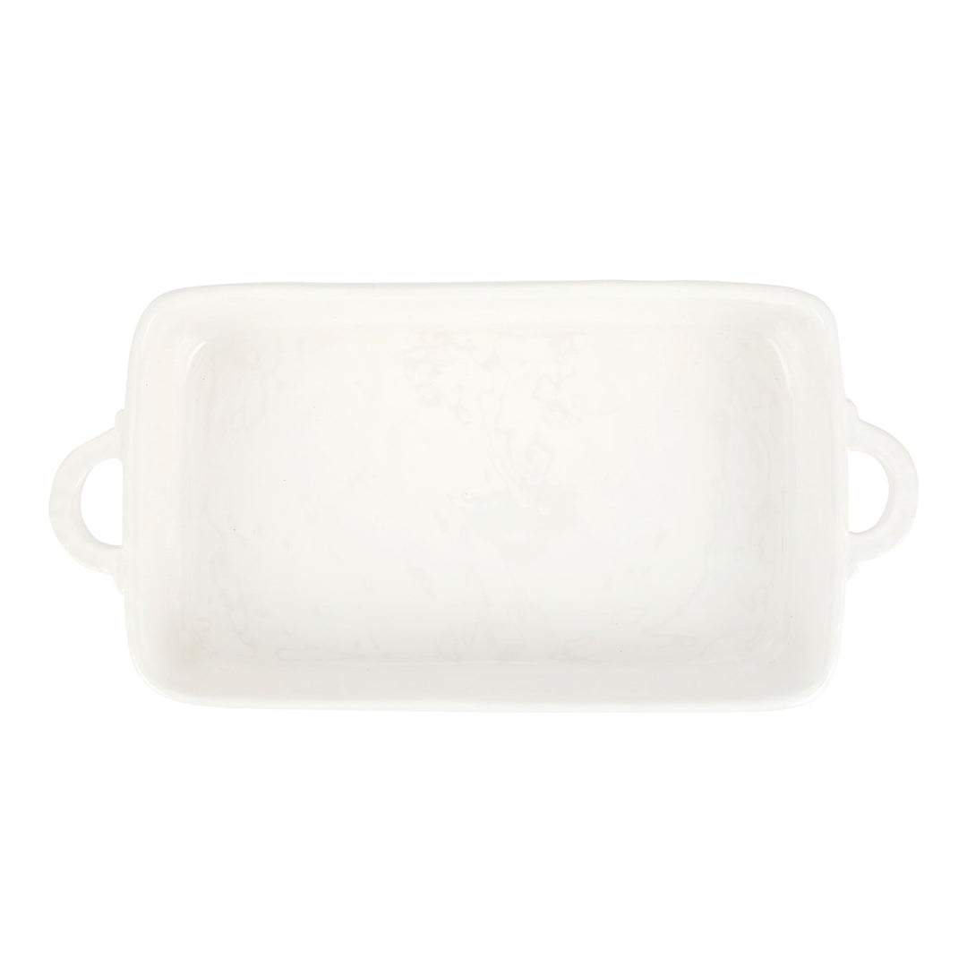 White rectangular ceramic baking dish with handles on a white background