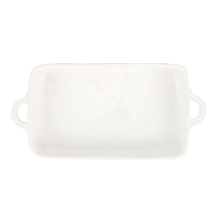 White rectangular ceramic baking dish with handles on a white background