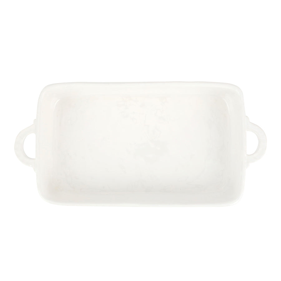 White rectangular ceramic baking dish with handles on a white background