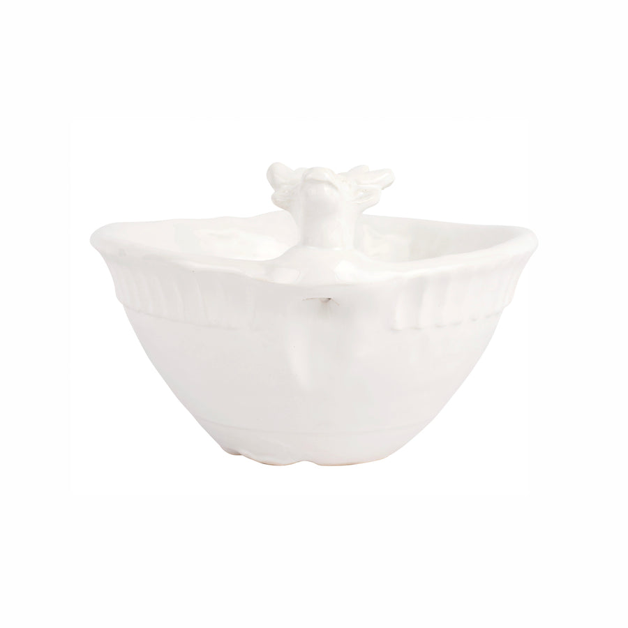 White ceramic bowl with reindeer design on a white background