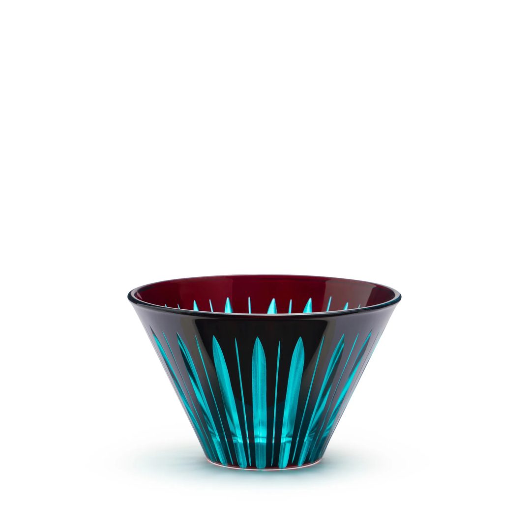 Decorative bowl with Bordeaux red interior and blue exterior on a white background