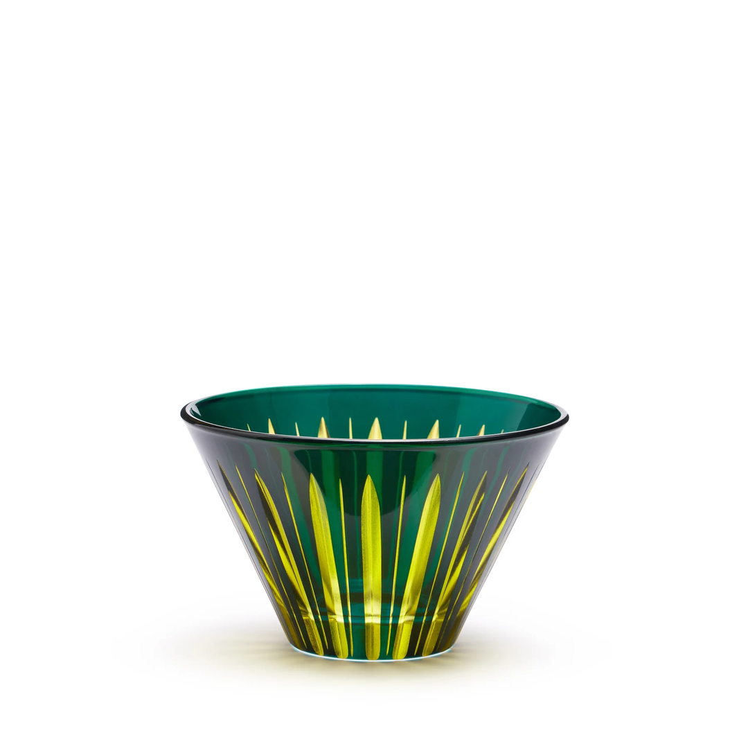 Decorative bowl with green and yellow design on a white background