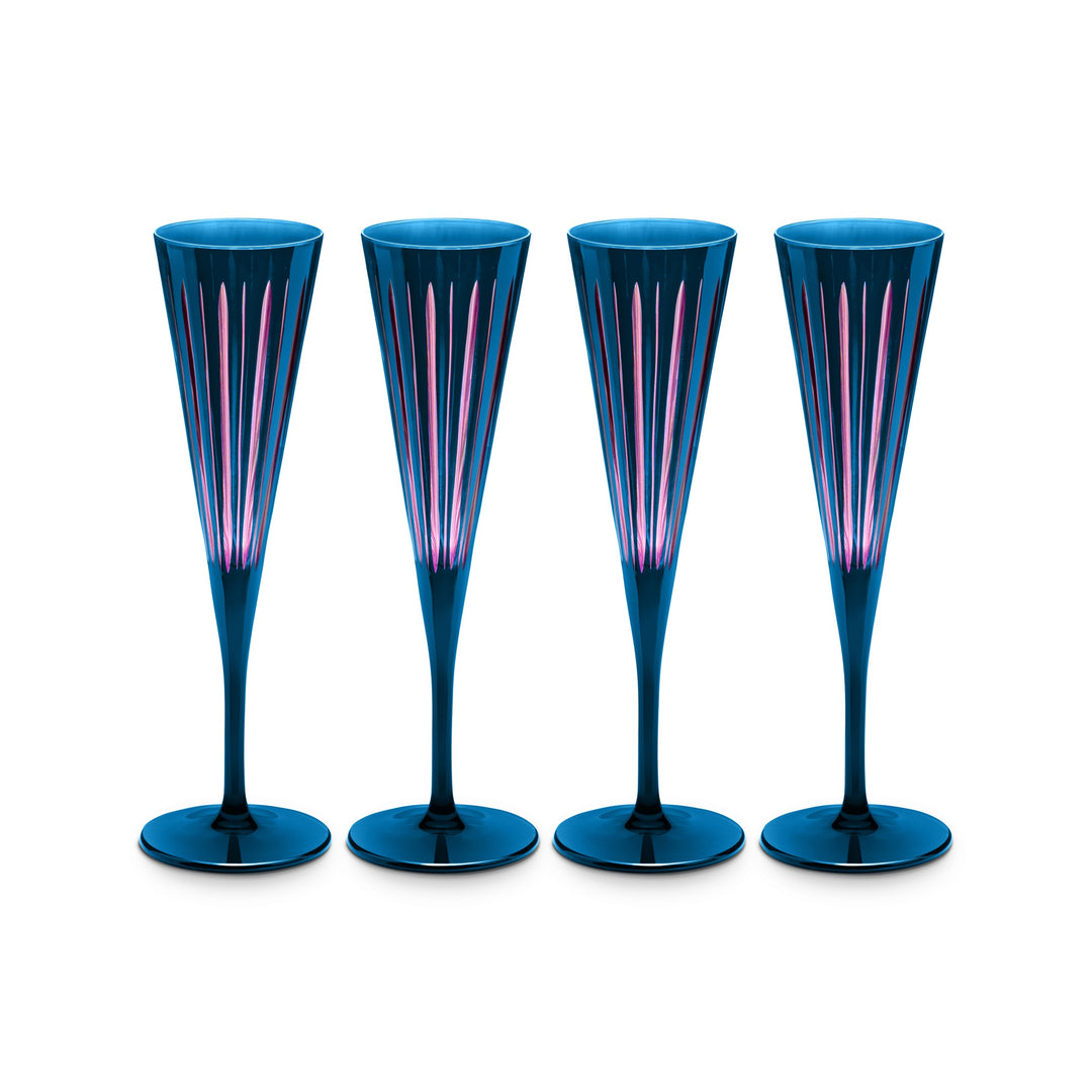 Four blue champagne flutes with pink interior 