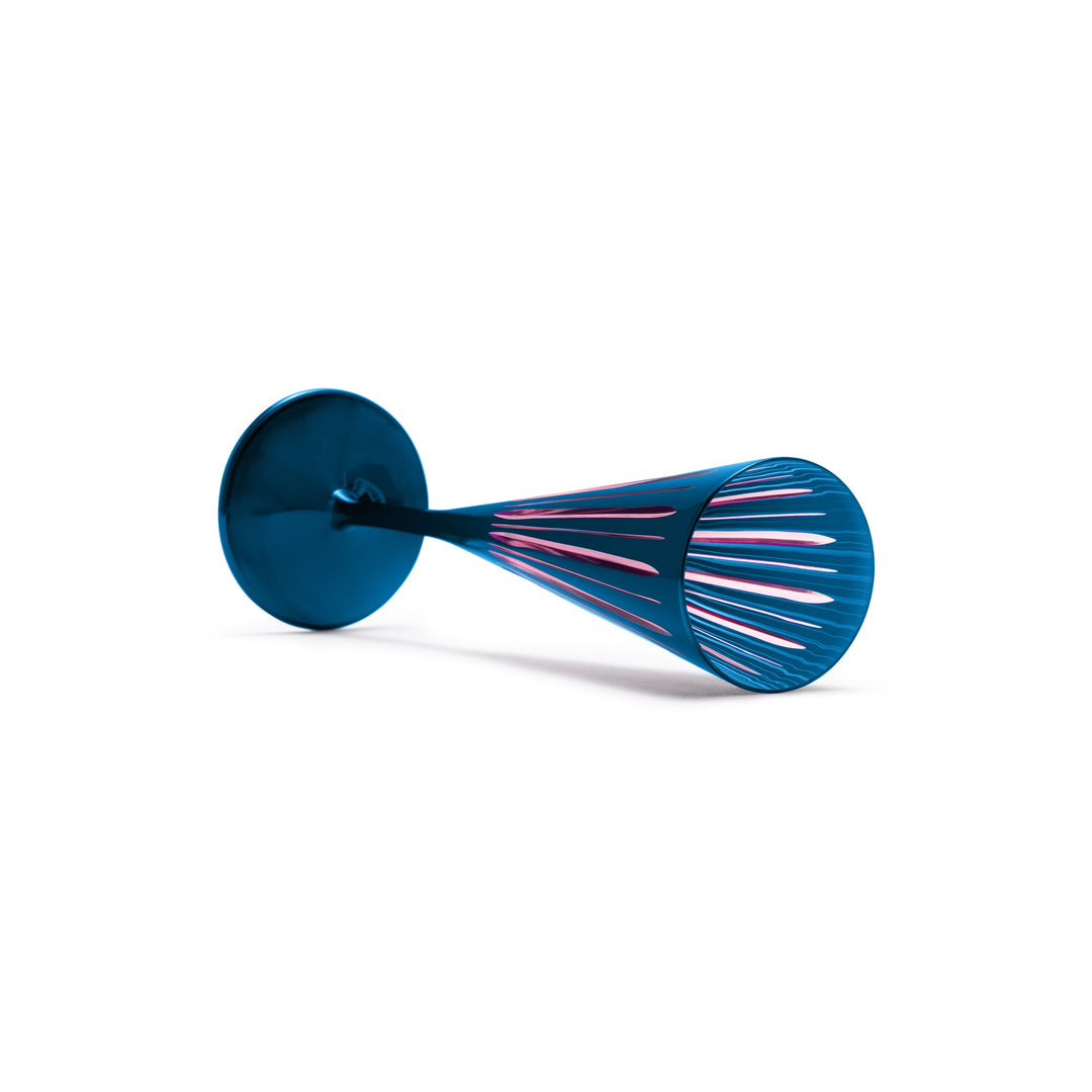 A blue and pink martini glass