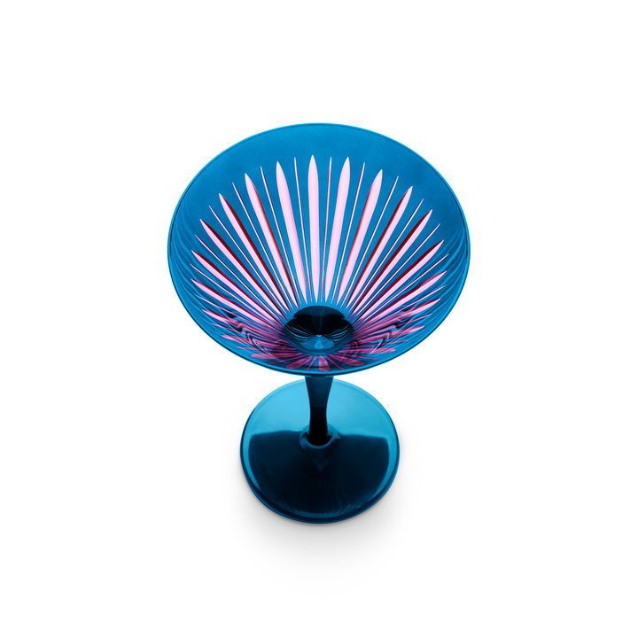 Blue martini glass with pink interior