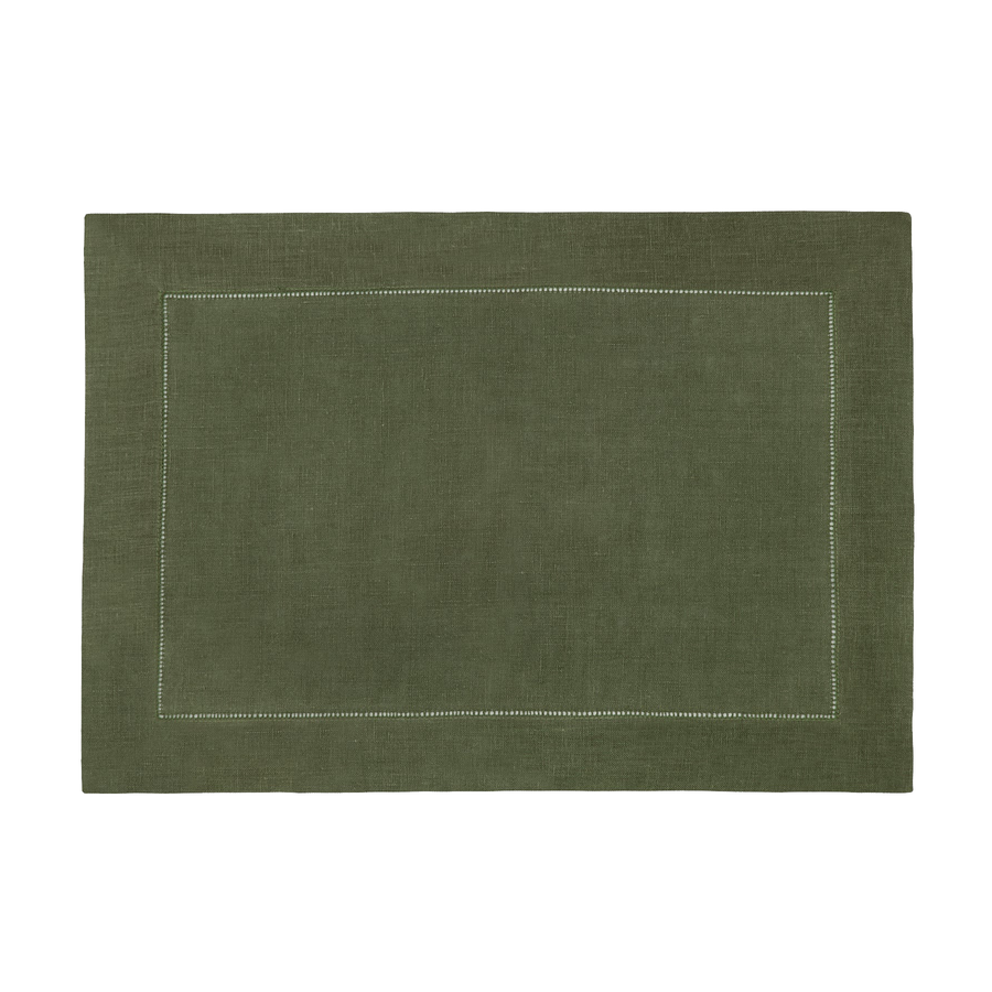 A green placemat with a stiched hem