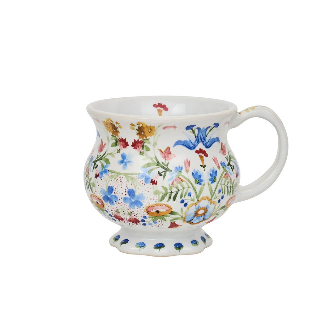 Decorative ceramic mug with floral pattern 