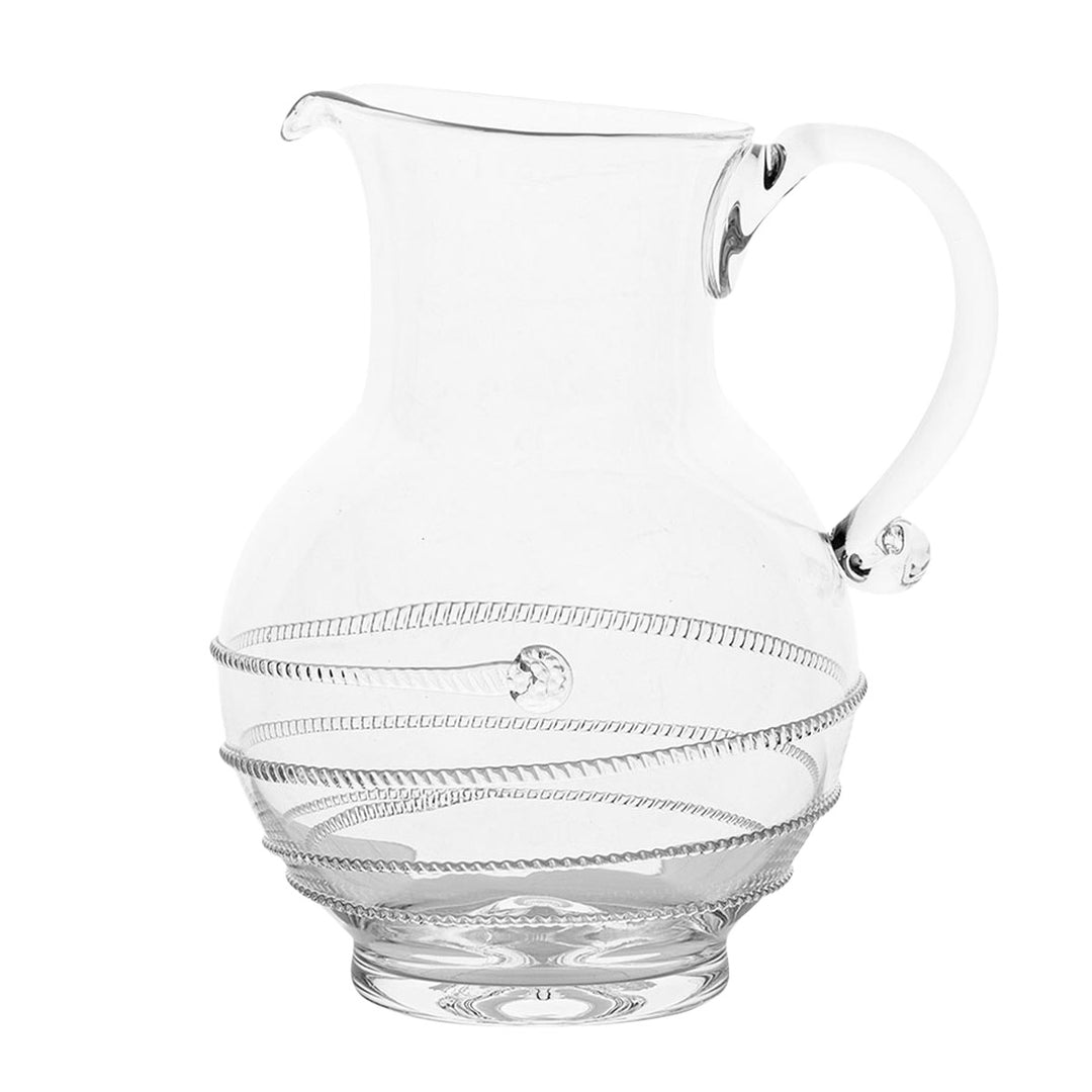 Clear glass pitcher with decorative ribbing