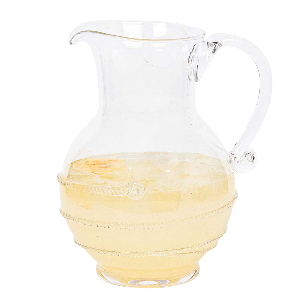Clear glass pitcher with a textured yellow base