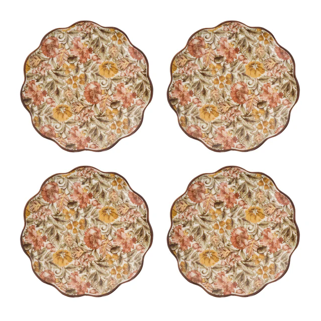 Four fall floral-patterned cocktail plates on a white background