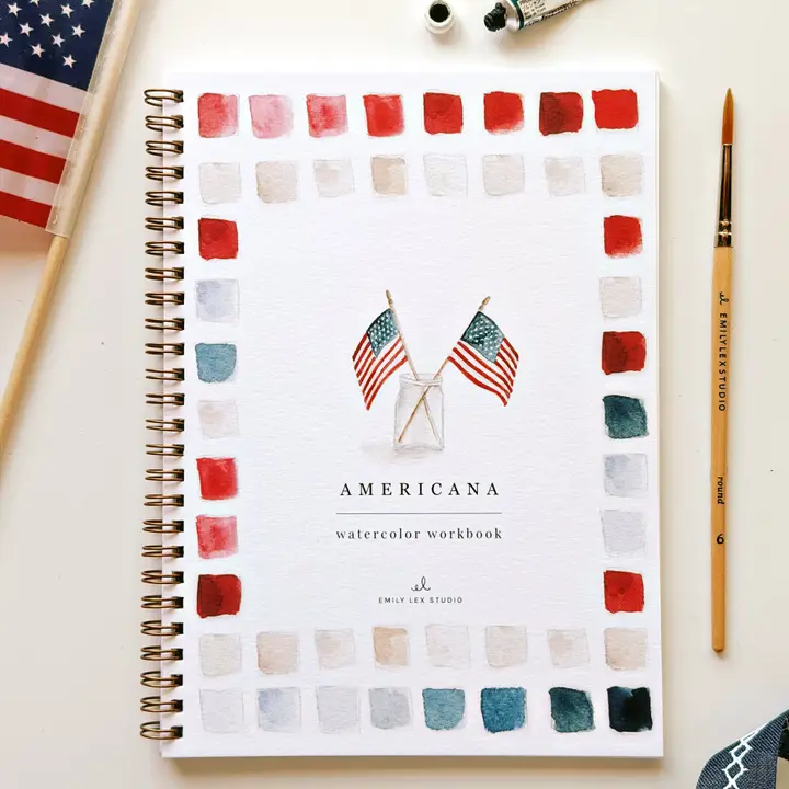 Notebook titled 'Americana Watercolor Workbook' with watercolor flags and color swatches