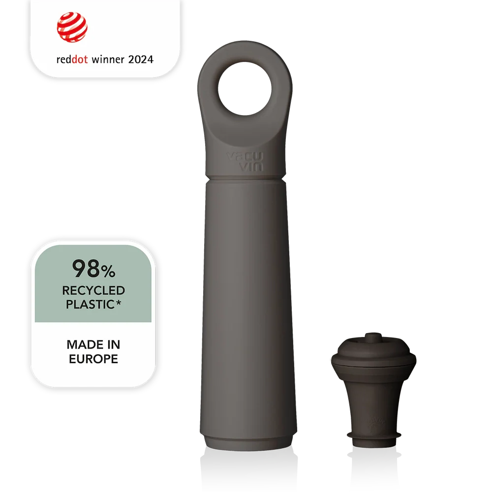 Dark gray wine bottle stopper with 'Made in Europe' and '98% Recycled Plastic' labels on a white background.