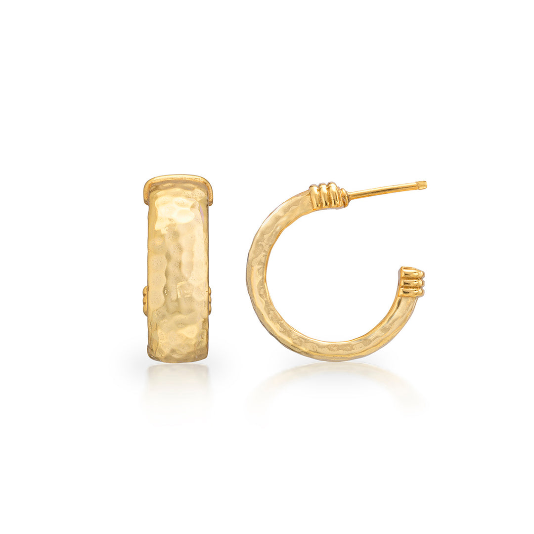 Gold hoop earrings on a white background