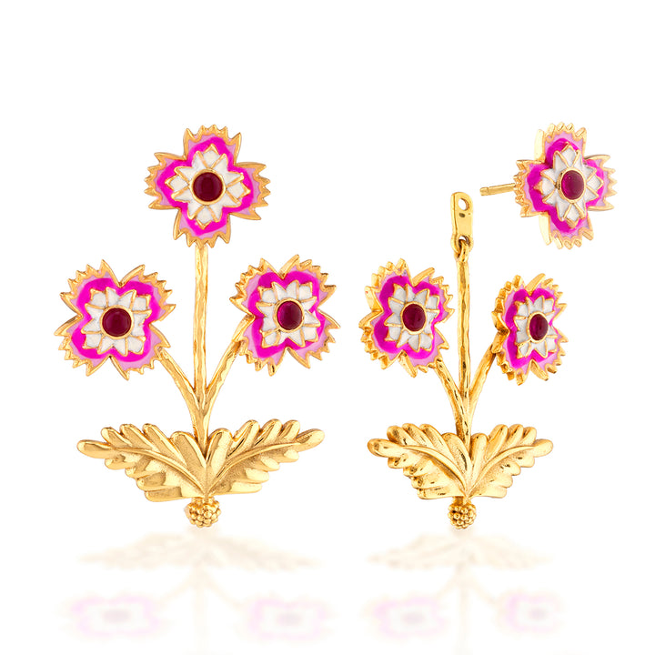 Convertible gold floral earrings with pink and red accents, showing a stud earring detaching from the botom hanging floral portion