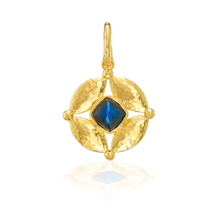 Gold pendant with a blue gemstone