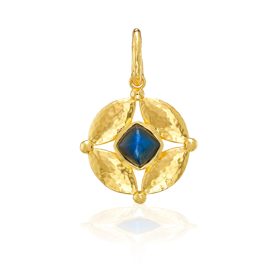 Gold pendant with a blue gemstone
