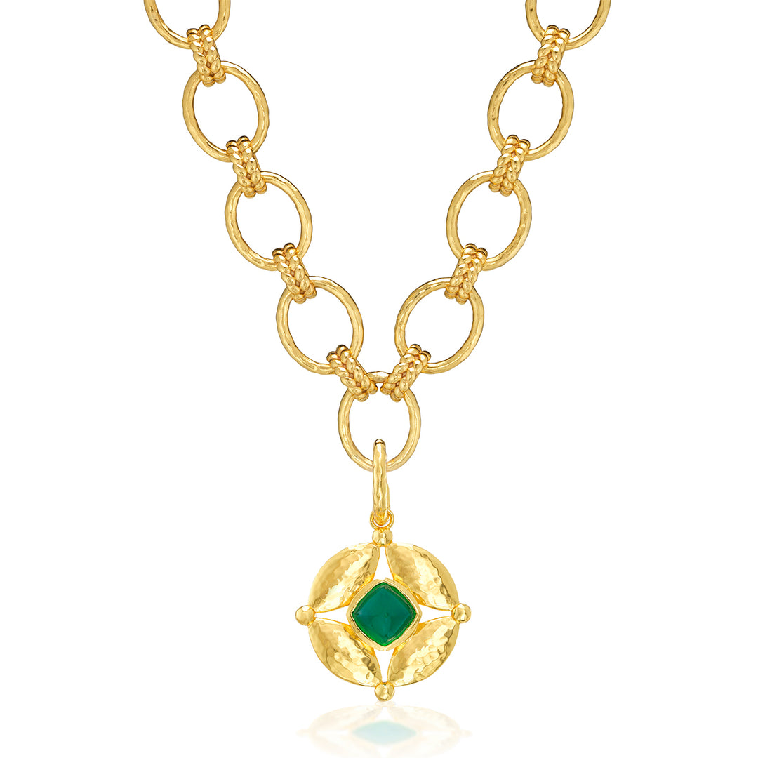 Gold necklace with a green gemstone pendant 
