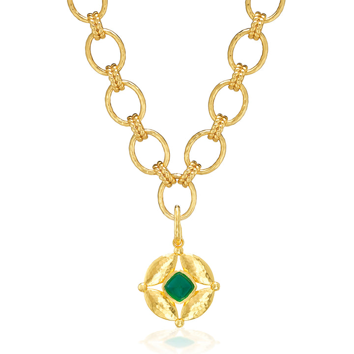 Gold necklace with a green gemstone pendant 
