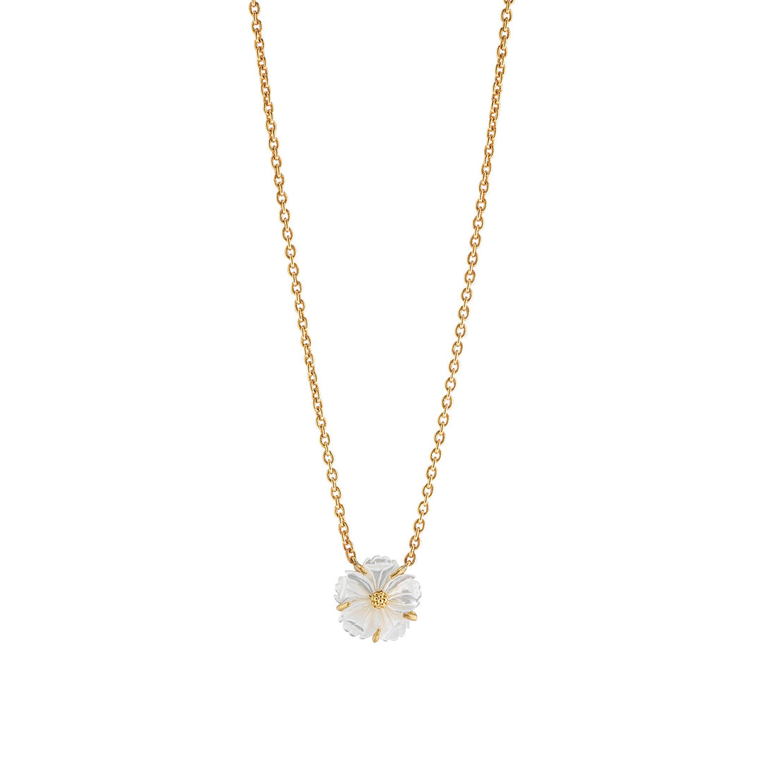 Gold necklace with a white flower pendant 