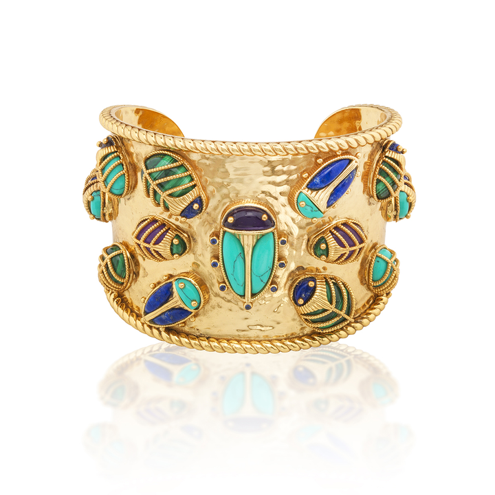 Gold cuff bracelet with scarab beetle design made of  turquoise, malachite, lapis lazuli, and amethyst stones