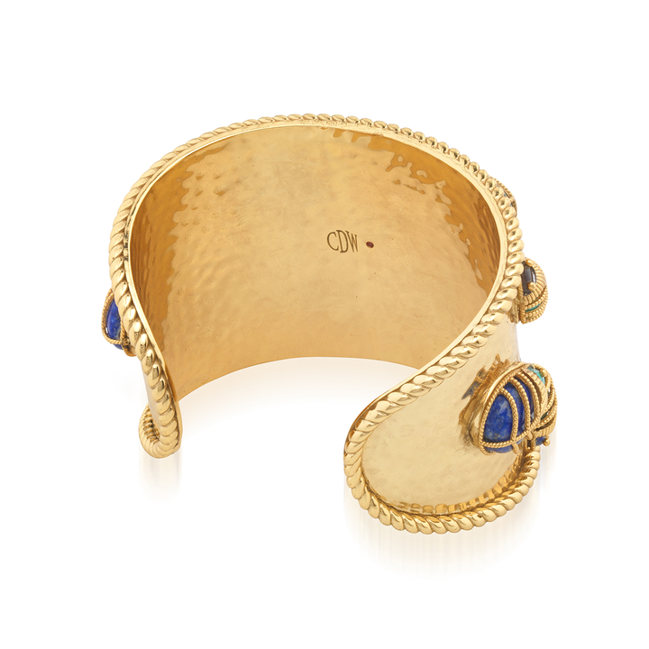 Gold bracelet with beetle accents signed "CDW " and a red ruby 